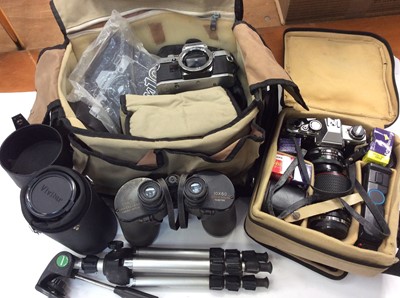 Lot 850 - Two Olympus OM-10 cameras, lenses and accessories