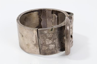 Lot 19 - Victorian silver hinged bangle with buckle design