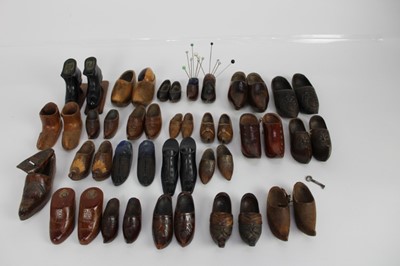 Lot 1933 - Collection 19th century and later wooden shoes including pin cushions