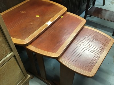 Lot 925 - Nest of three coffee tables with inset leather tops