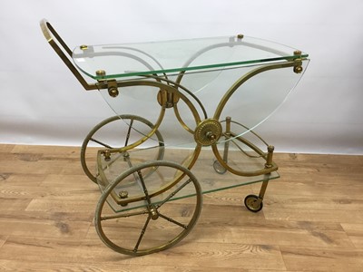 Lot 137 - Brass and glass drinks trolley