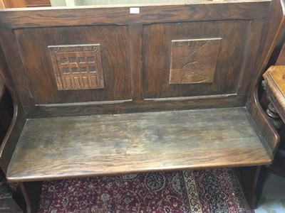 Lot 943 - Oak hall bench with carved panels