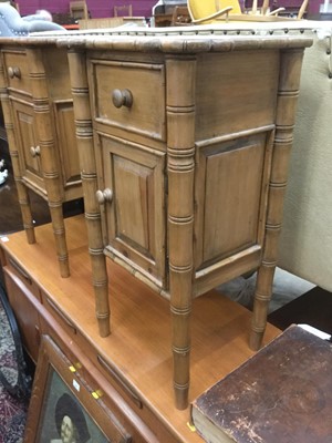 Lot 945 - Pair pine simulated bamboo bedside tables each with drawer and cupboard