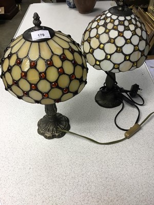 Lot 179 - Two Tiffany style table lamps with leaded glass shades