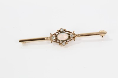 Lot 23 - Edwardian-style opal and diamond bar brooch with an oval cabochon opal and four single cut diamonds