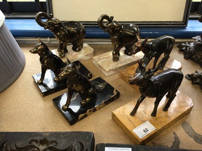 Lot 62 - Three pairs of cast metal figures on stone bases, including elephants, dogs and deer