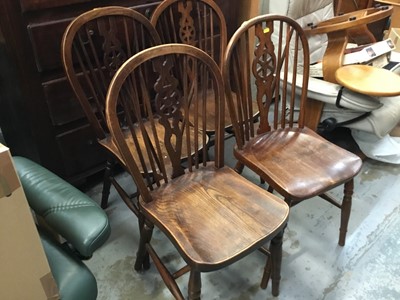 Lot 960 - Four old oak and elm Windsor stick back chairs