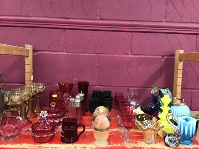 Lot 565 - Cranberry wine glasses, sugar shakers and other ware plus vasoline and coloured glassware