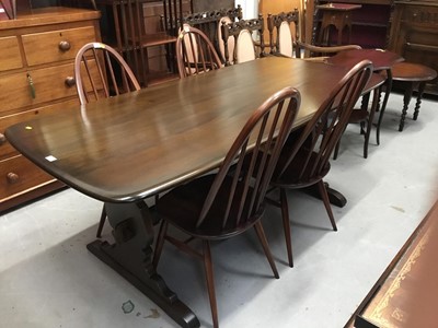 Lot 965 - Ercol refectory dining table and four matching chairs