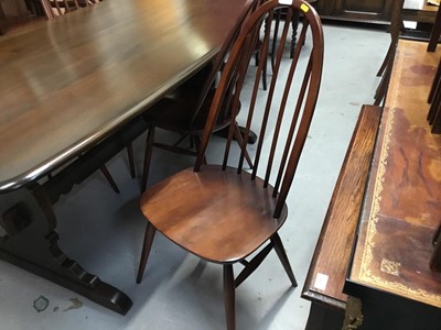 Lot 965 - Ercol refectory dining table and four matching chairs