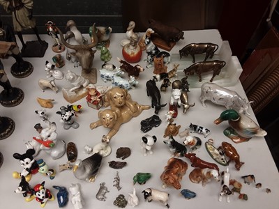 Lot 269 - Collection of various animal ornaments including dogs, bulls, ducks etc