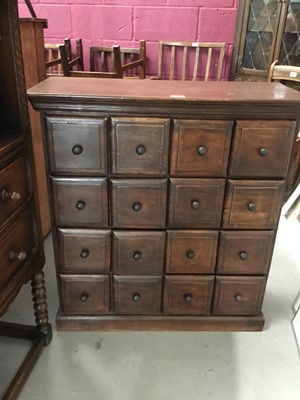 Lot 967 - Mahogany nest of 16 drawers with bun handles 81cm wide, 86 cm high, 33.5 cm deep