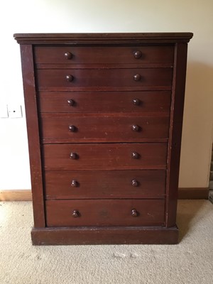 Lot 974 - Victorian mahogany Wellington chest of seven drawers with bun handles