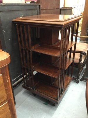 Lot 969 - Edwardian walnut four tier revolving bookcase 115 cm high, 60 cm