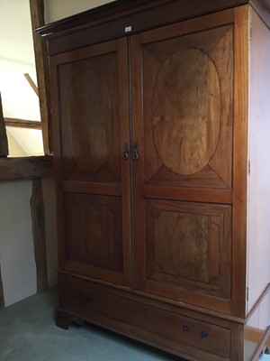 Lot 971 - Edwardian mahogany wardrobe with twin inlaid doors enclosing hanging space, above a single drawer, on bracket feet