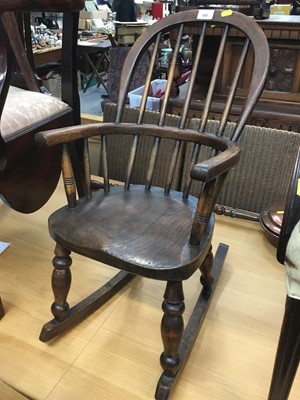 Lot 995 - Childs Windsor elm rocking elbow chair