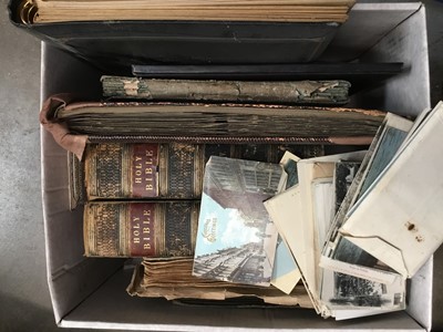 Lot 201 - Old postcards in albums, photographs, bible, and ephemera