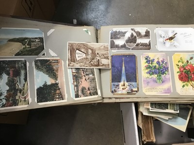 Lot 201 - Old postcards in albums, photographs, bible, and ephemera