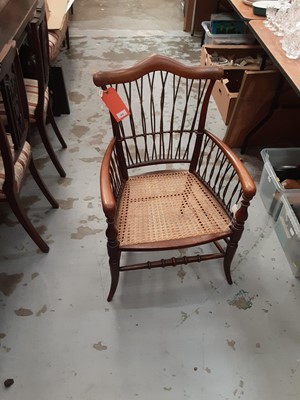 Lot 978 - Edwardian mahogany elbow chair with cane seat, another similar, Regency dining chair and one other (4)