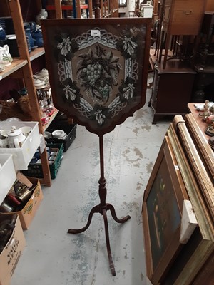 Lot 984 - Victorian beadwork pole screen decorated with grapes on tripod base