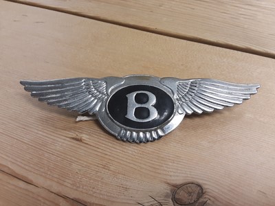 Lot 275 - 1950's Bentley boot badge and a horse head car mascot