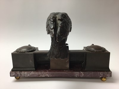 Lot 209 - Nazi Kreigsmarine bronze and marble desk stand, with central bronze Eagle on raised back set with Nazi badges above two inkwells, one shaped marble base raised on ball feet, 34cm in length