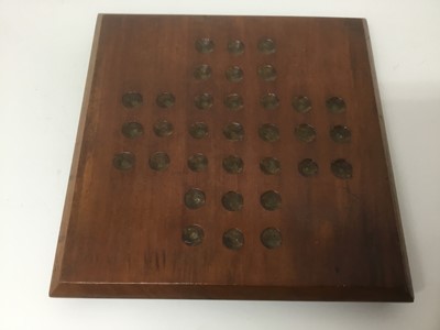Lot 35 - Victorian solitaire board and marbles.