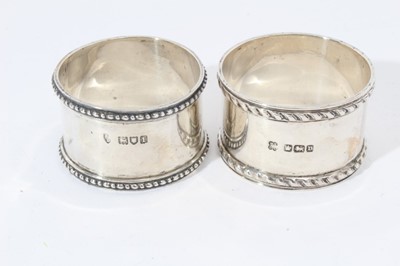 Lot 92 - George V silver sugar bowl of circular form with engraved inscription and flared rim, on a circular foot and (London 1922, together with three Victorian salts, two silver napkin ring