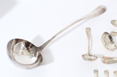 Lot 94 - Collection of George V silver Hanoverian pattern spoons and ladles (London 1915), all at 19.5ozs