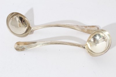 Lot 94 - Collection of George V silver Hanoverian pattern spoons and ladles (London 1915), all at 19.5ozs