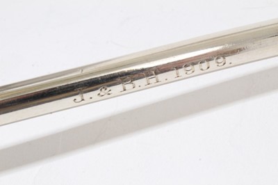 Lot 177 - Unusual Edwardian silver instrument with open funnel top, straight shaft engraved 'J.& B.H. 1909', with angled end piece, possibly a surgical instrument