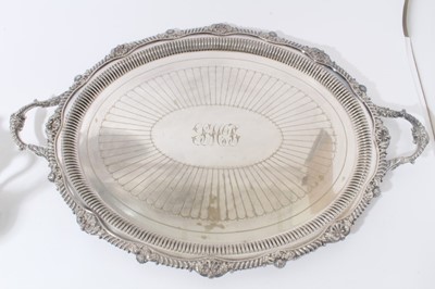 Lot 7 - Late Victorian silver plated two handled oval tray with shell and gadrooned border, by the Goldsmiths & Silversmiths Company