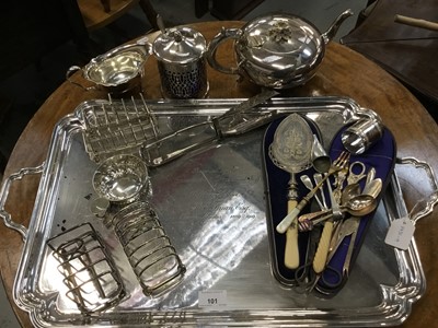 Lot 101 - Mixed group of silver plate to include a two handled tray, teapot, toast racks, French wine taster and other items