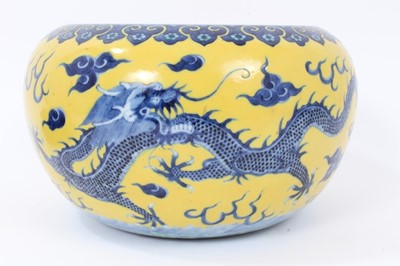 Lot 191 - Chinese porcelain bowl with dragon decoration on a yellow ground