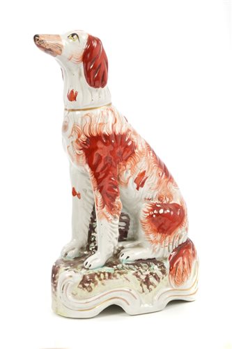 Lot 299 - Unusual Victorian seated dog ornament with red...