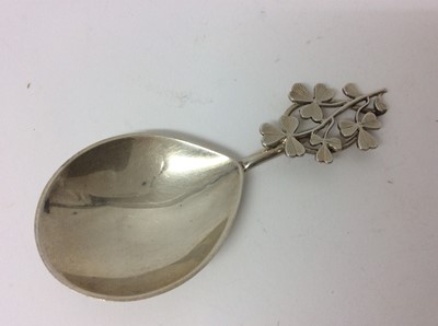 Lot 214 - Silver caddy spoon with clover leaf formed handle