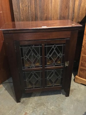 Lot 1016 - Victorian mahogany cupboard with stained glass panels on bracket feet. 68 cm wide, 86 cm high, 32 cm deep