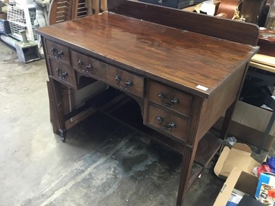 Lot 1020 - Edwardian mahogany kneehole desk with five drawers and undertier on reeded taper legs 107cm