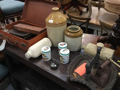 Lot 125 - Mixed lot to clued stoneware bottles, cast iron boot scrapper, metalware and sundries