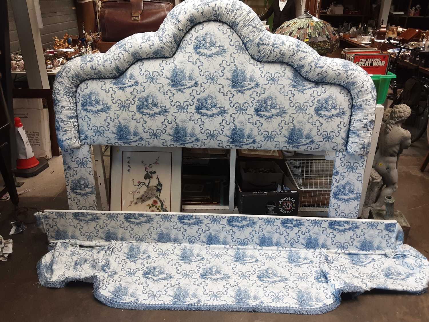 Lot 1022 - Modern blue and white upholstered headboard and a matching pelmet