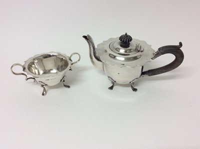Lot 196 - Silver teapot and matching two handled sugar bowl
