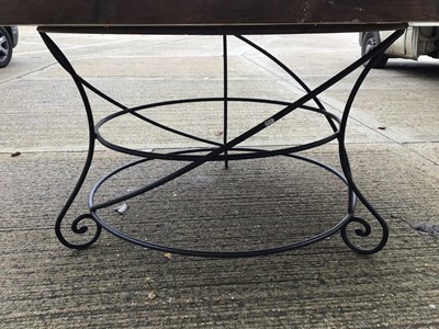 Lot 979 - Large circular table on wrought iron base