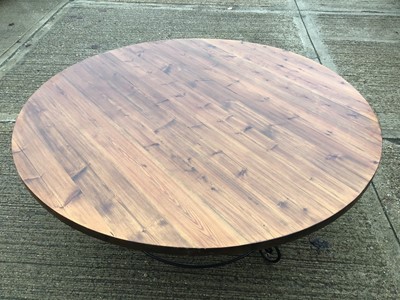 Lot 979 - Large circular table on wrought iron base