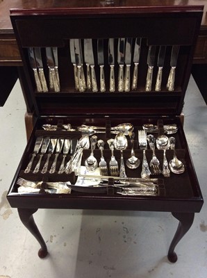 Lot 498 - Canteen silver plated cutlery in mahogany table cabinet on cabriole legs