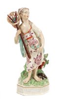 Lot 309 - 18th century Derby figure of a fishergirl...