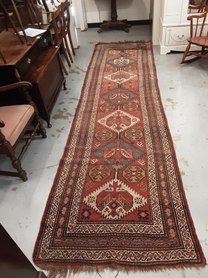 Lot 1052 - Eastern runner with geometric decoration, 390cm x 103cm