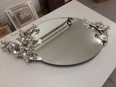 Lot 1058 - Pair of bevelled wall mirrors in oval frames with applied floral decoration