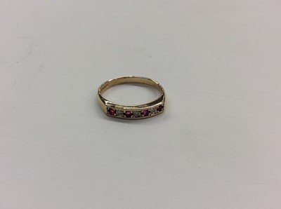 Lot 719 - 9ct gold diamond and ruby half eternity style ring