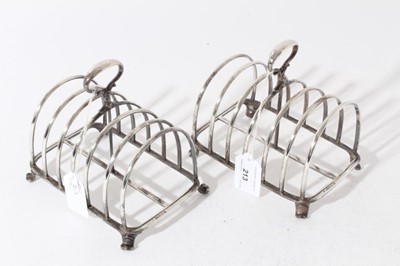 Lot 213 - Pair of impressive Victorian Regimental silver six division toast racks of arched form, the loop handles with engraved Regimental crest of the Grenadier Guards, (London 1870)