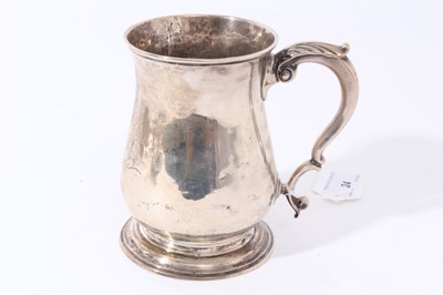 Lot 24 - George II silver tankard of baluster form with engraved inscription and initials 'John Nichols 1881', with scroll handle, on circular foot, (London 1757)